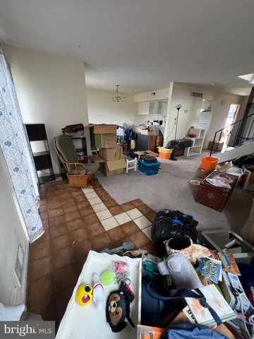 a bed room with furniture and cars