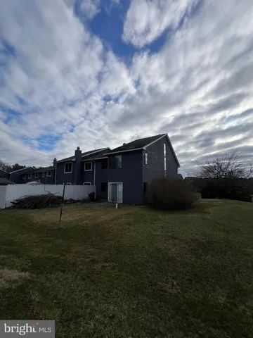 a house view with garden space