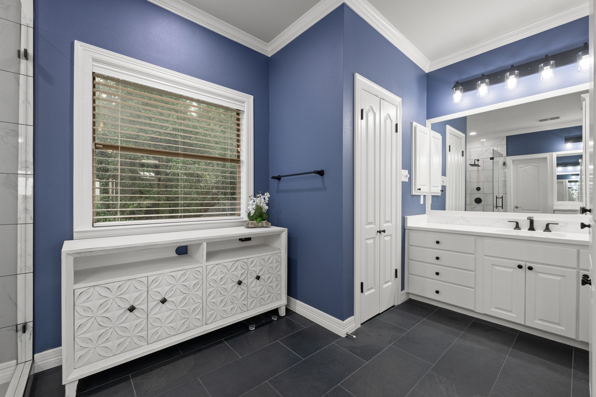 6004 Mt Bonnell Road Austin, TX 78731 - Photo 16 of 24 a spacious bathroom with 2 sink tub and a mirror