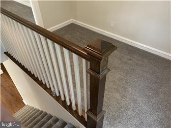 905 Rodman Road Bellefonte, DE 19809 - Photo 16 of 25 a view of staircase and floor