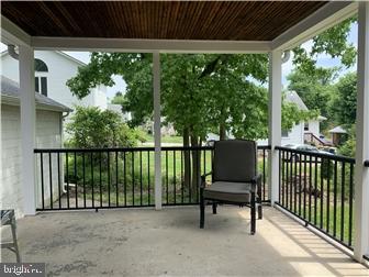 905 Rodman Road Bellefonte, DE 19809 - Photo 24 of 25 a view of a chair and table in the porch