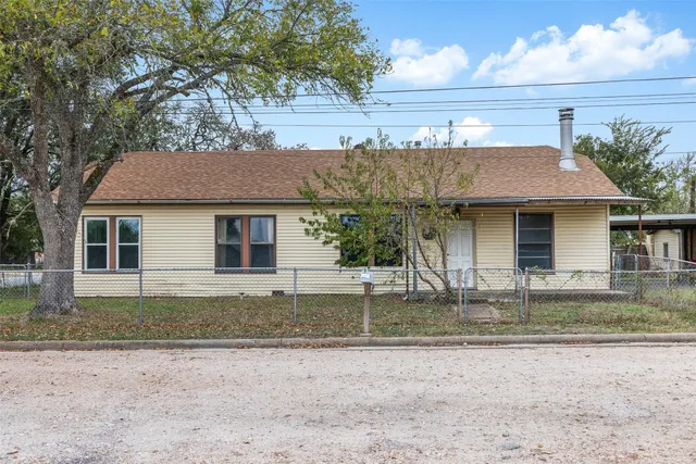a front view of a house with a porch
