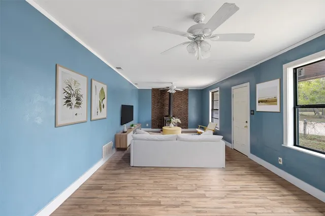 a living room with furniture and window