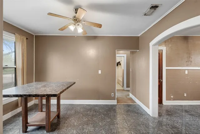 a view of a livingroom with furniture and cabinet