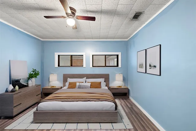 a bedroom with a bed and window