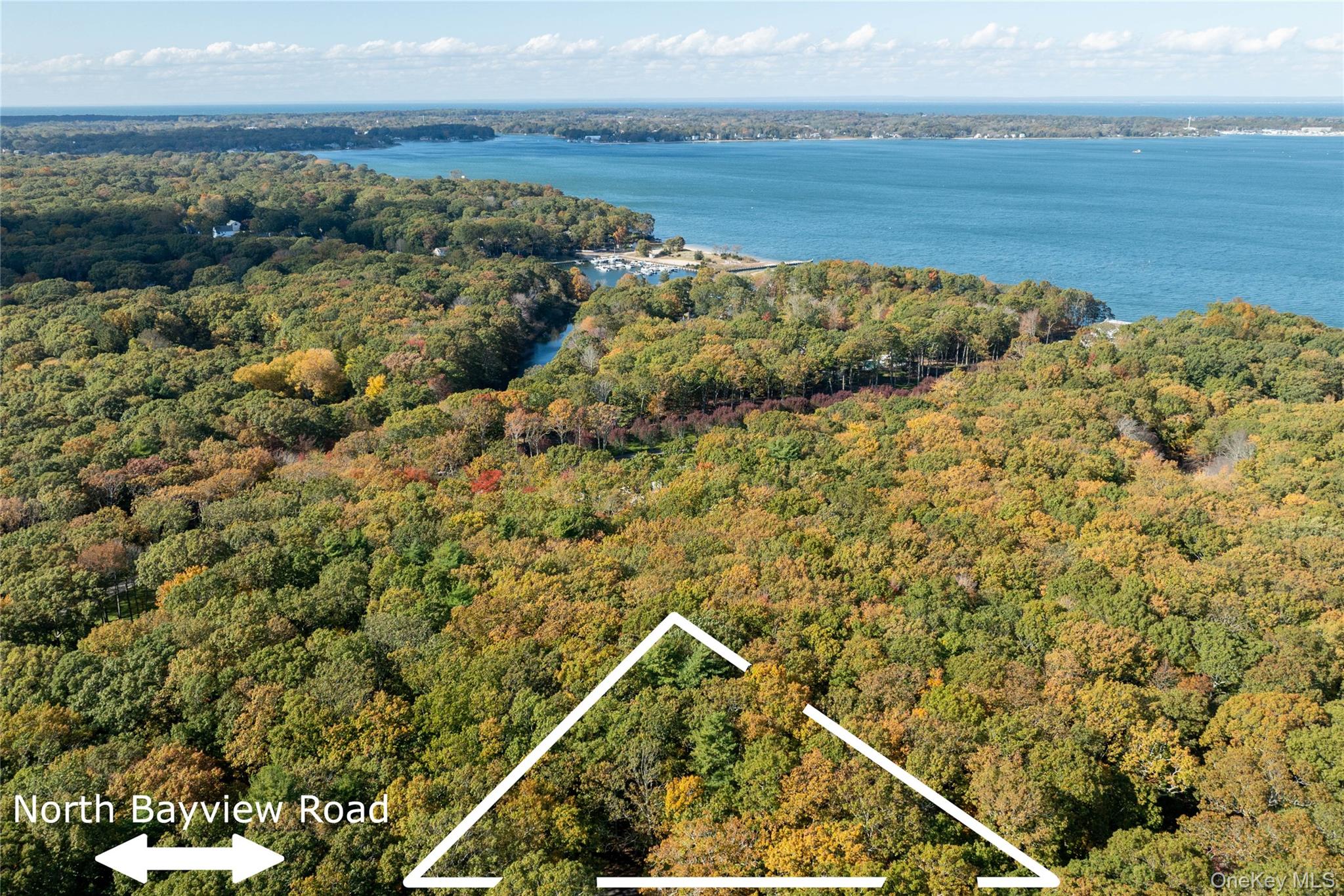 11195 North Bayview Road Southold, NY 11971 - Photo 3 of 7 a view of a lake with a mountain