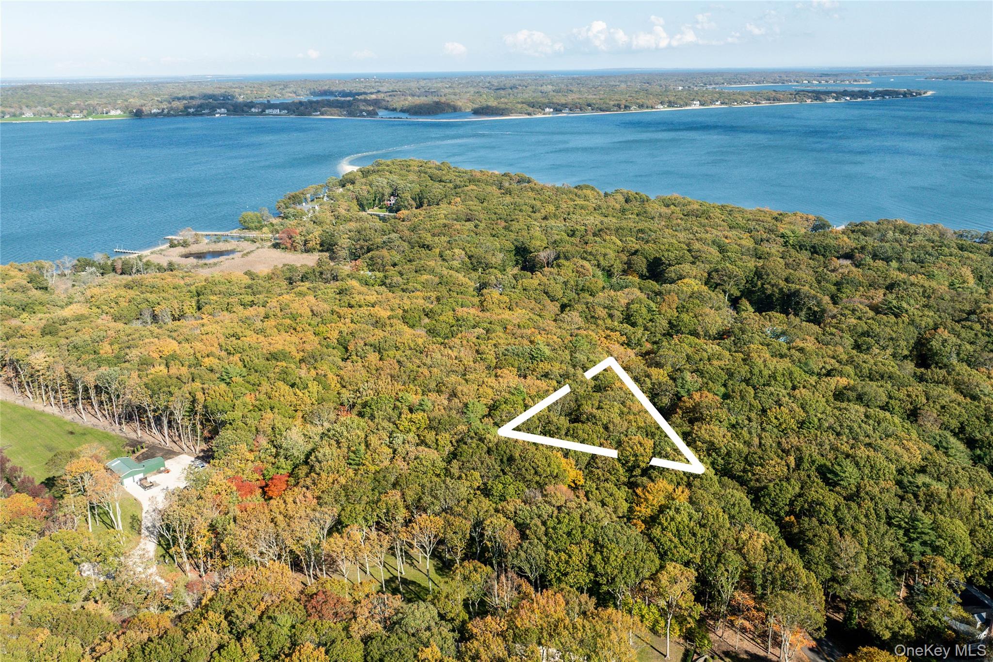 11195 North Bayview Road Southold, NY 11971 - Photo 5 of 7 a view of a lake with a mountain in the background