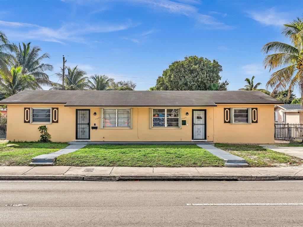 front view of a house and a yard