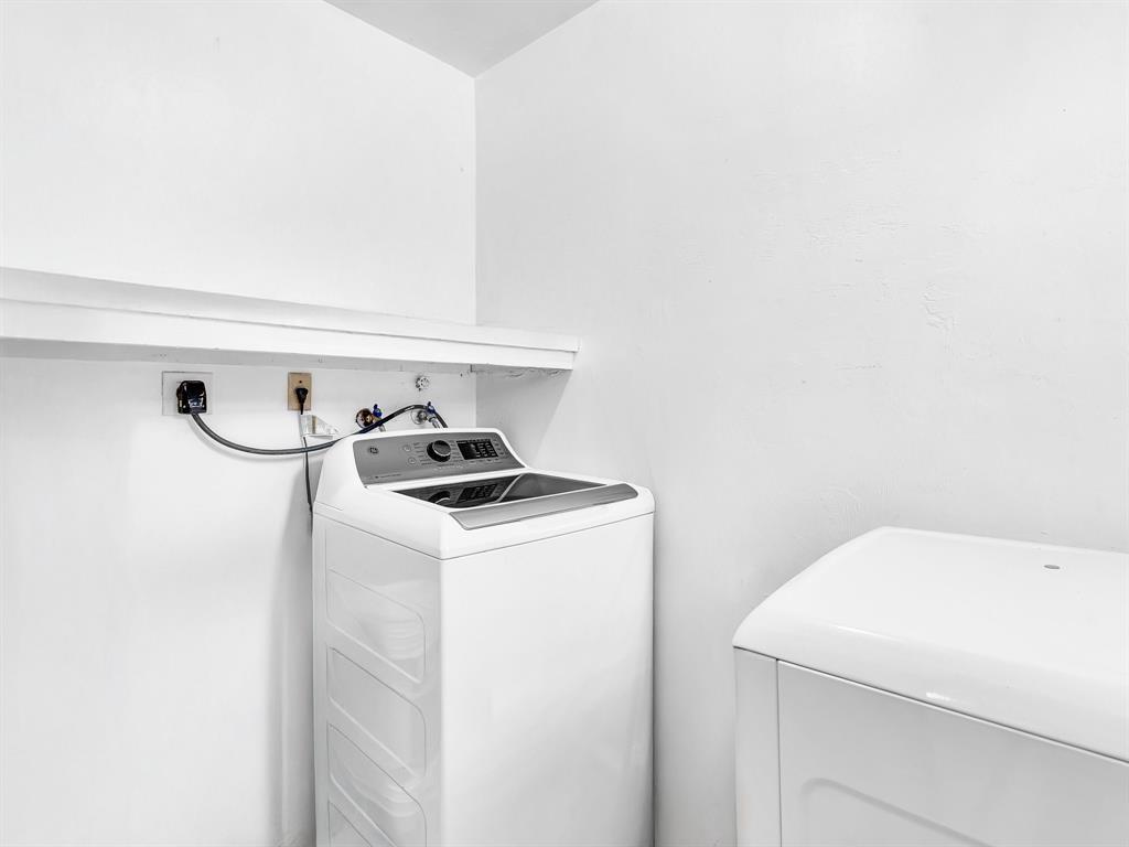 1052 Northwest 103rd Street Miami, FL 33150 - Photo 29 of 40 a utility room with dryer and washer