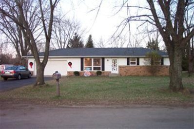11906 Candlewick Road South Demotte, IN 46310 - Photo 1 of 1 a front view of a house with a garden and trees