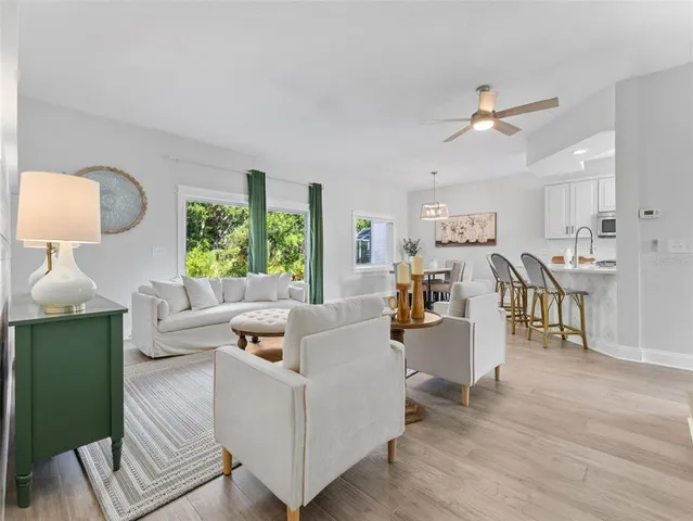 a bathroom with a toilet a sink and a mirror
