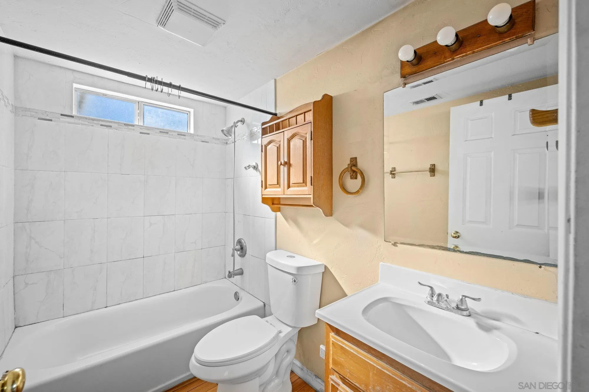 1703 Ashley Road Ramona, CA 92065 - Photo 21 of 36 a bathroom with a sink toilet and shower
