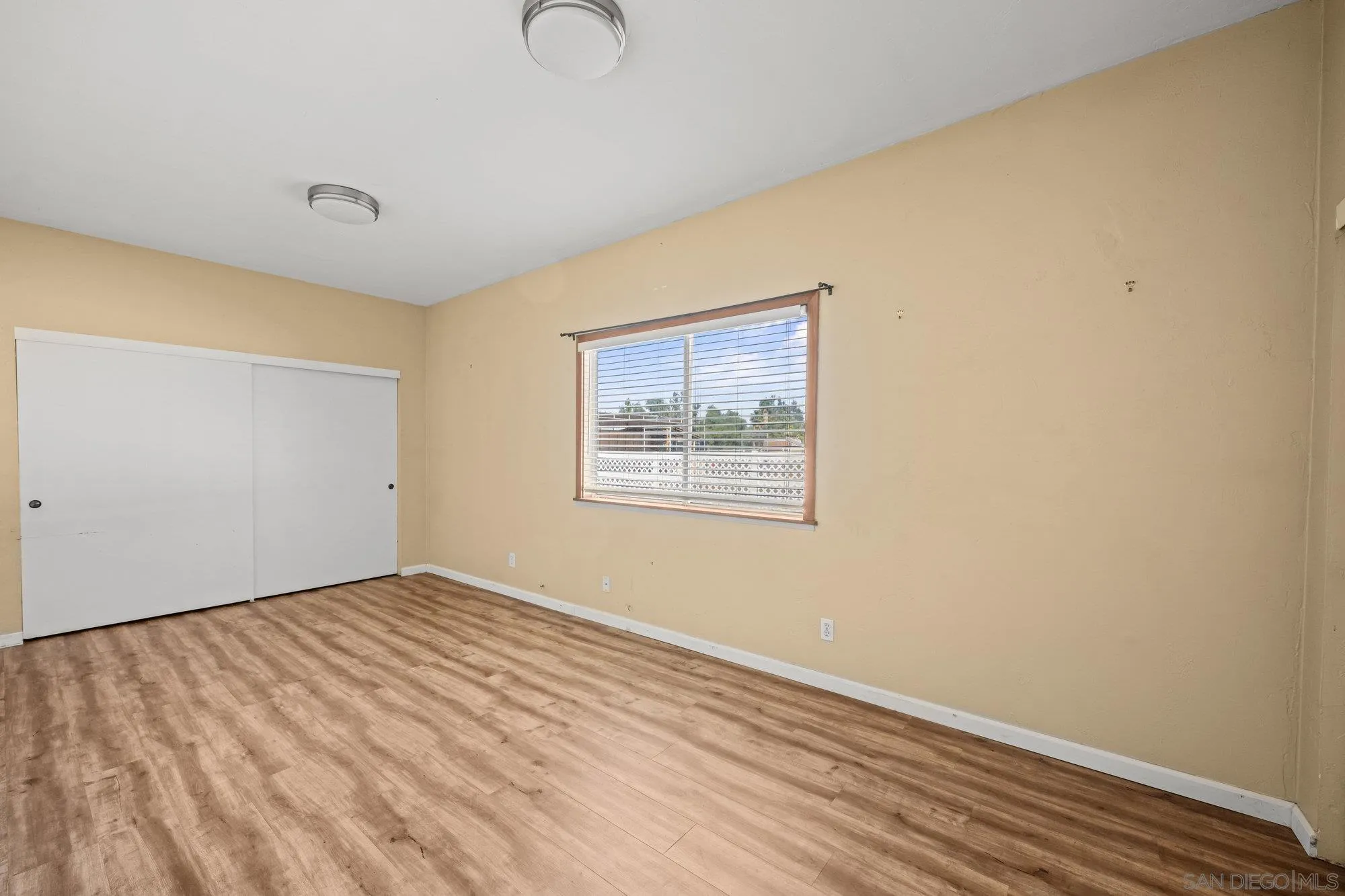 1703 Ashley Road Ramona, CA 92065 - Photo 31 of 36 a view of an empty room with wooden floor