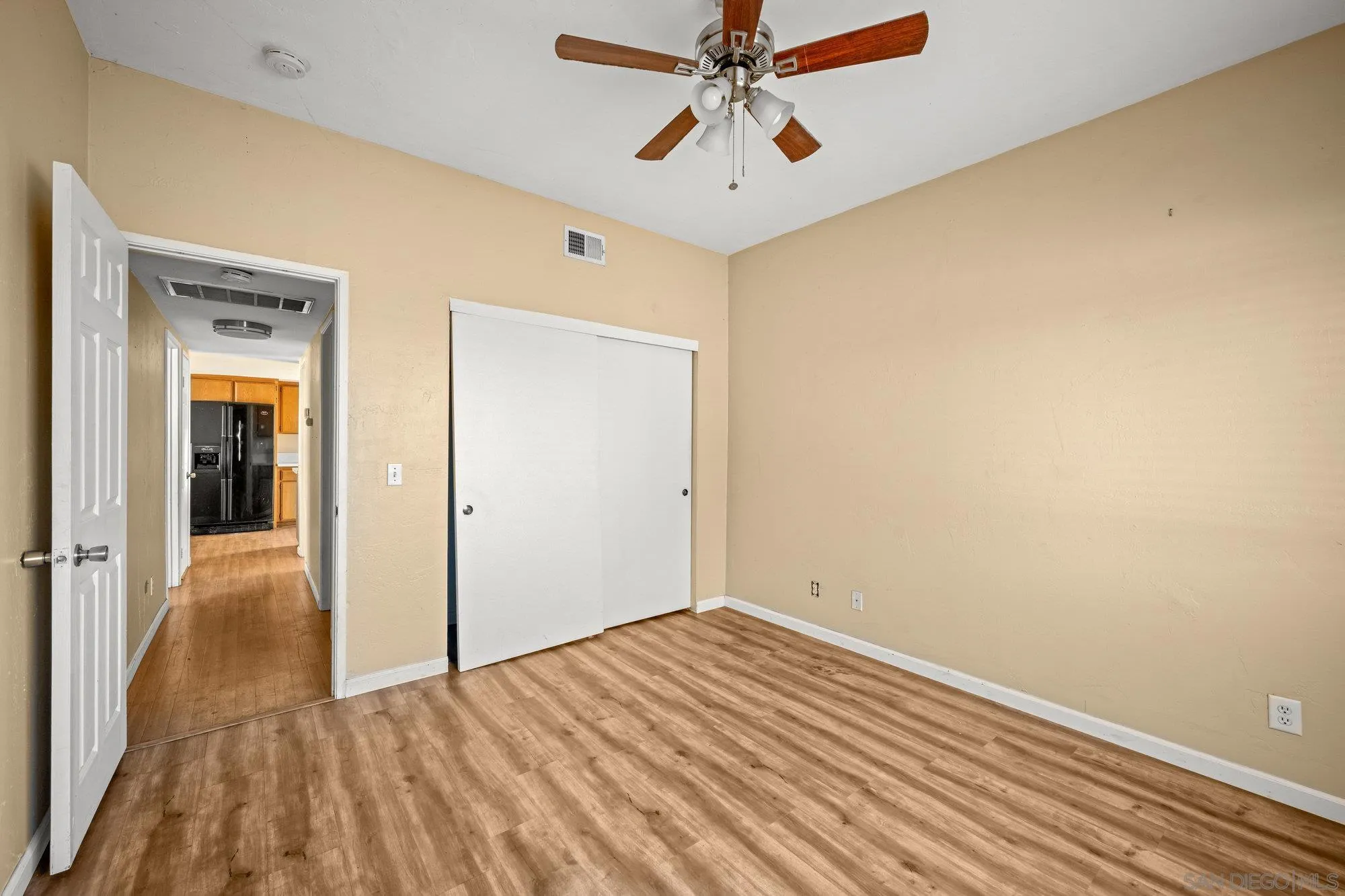 1703 Ashley Road Ramona, CA 92065 - Photo 32 of 36 a view of a room with wooden floor and closet area