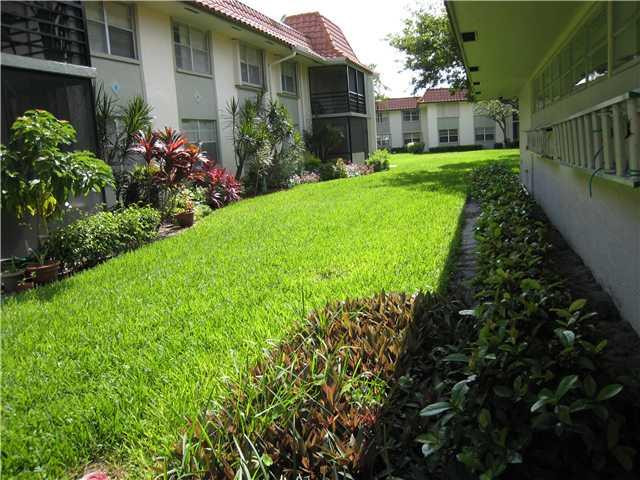 1124 Northwest 13th Street, Unit 212A Boca Raton, FL 33486 - Photo 5 of 12 Exterior Front