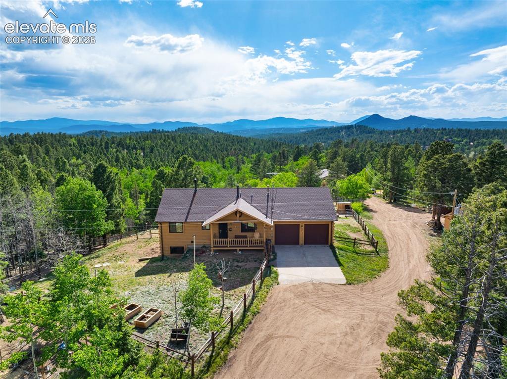 4269 Cedar Mountain Road Divide, CO 80814 - Photo 1 of 39 3 bed 3 bath home on 20 acres with views of the Great Continental Divide