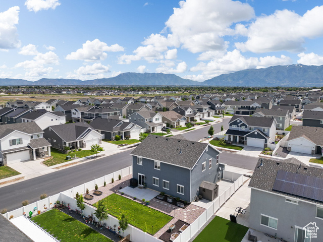 3456 South Linden Way Syracuse, UT 84075 - Photo 39 of 50 Aerial perspective of suburban area featuring mountains