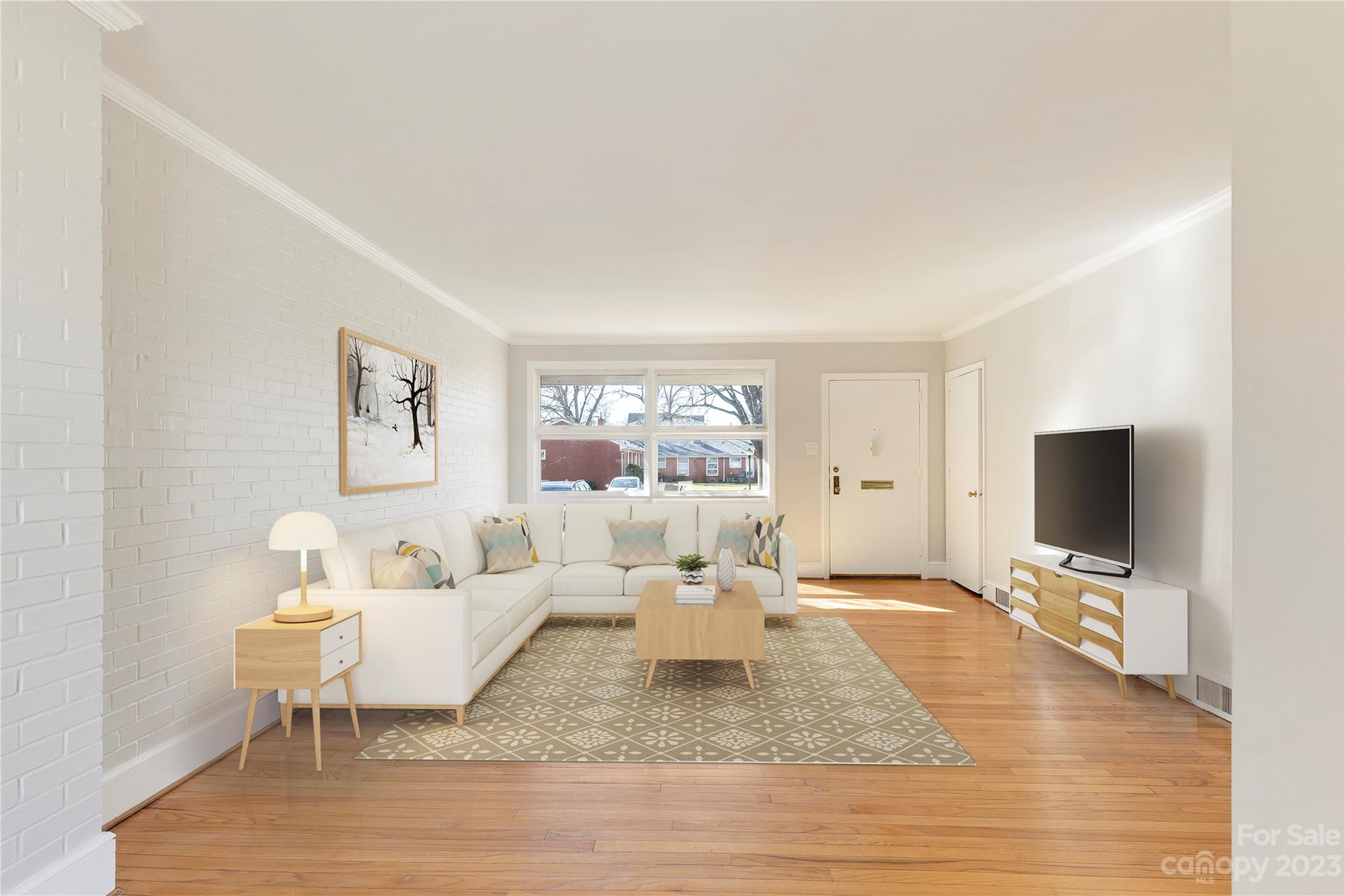 350 South Sharon Amity Road Charlotte, NC 28211 - Photo 11 of 21 a living room with furniture and a flat screen tv