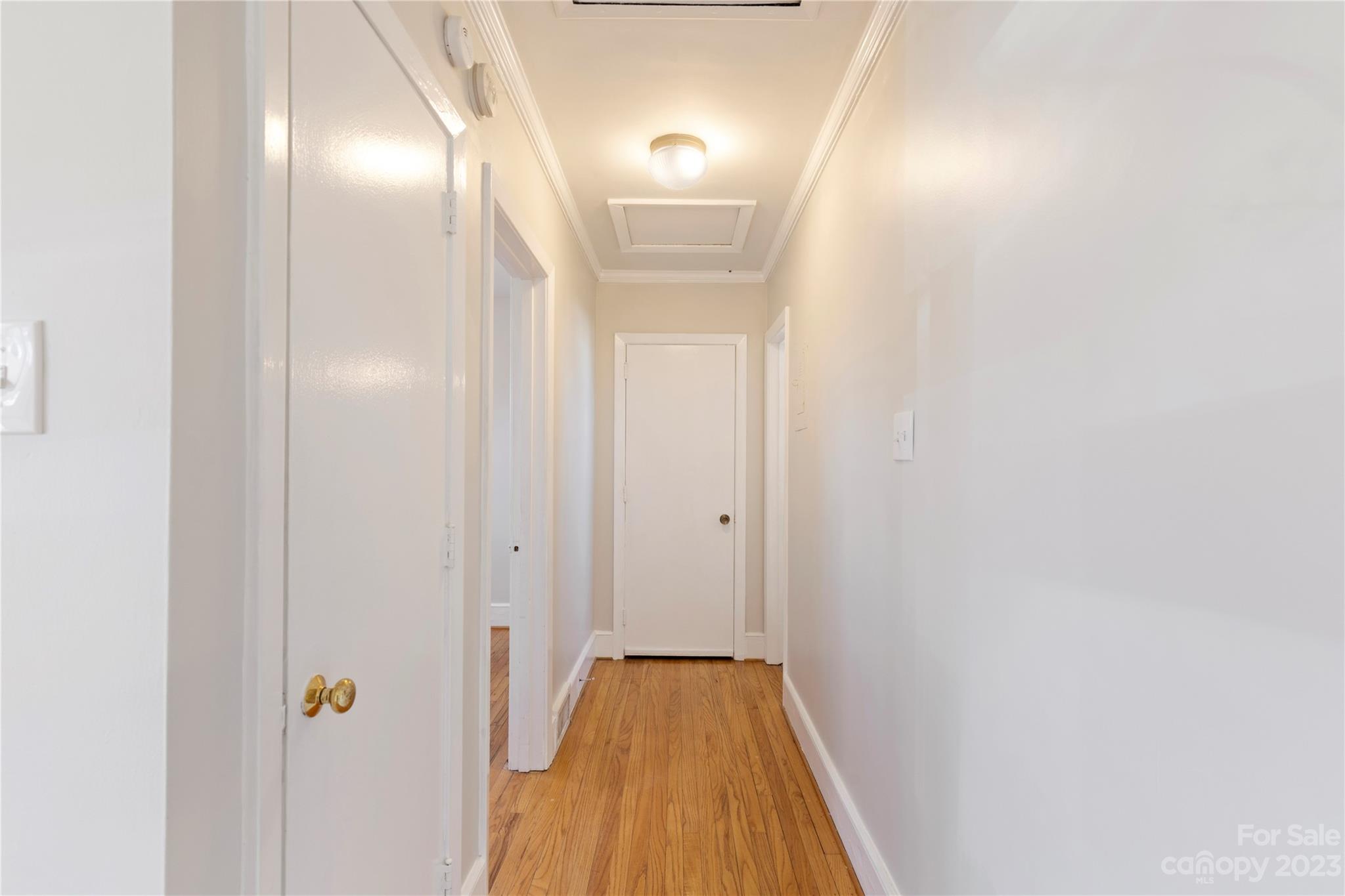 350 South Sharon Amity Road Charlotte, NC 28211 - Photo 13 of 21 a view of a hallway with wooden floor