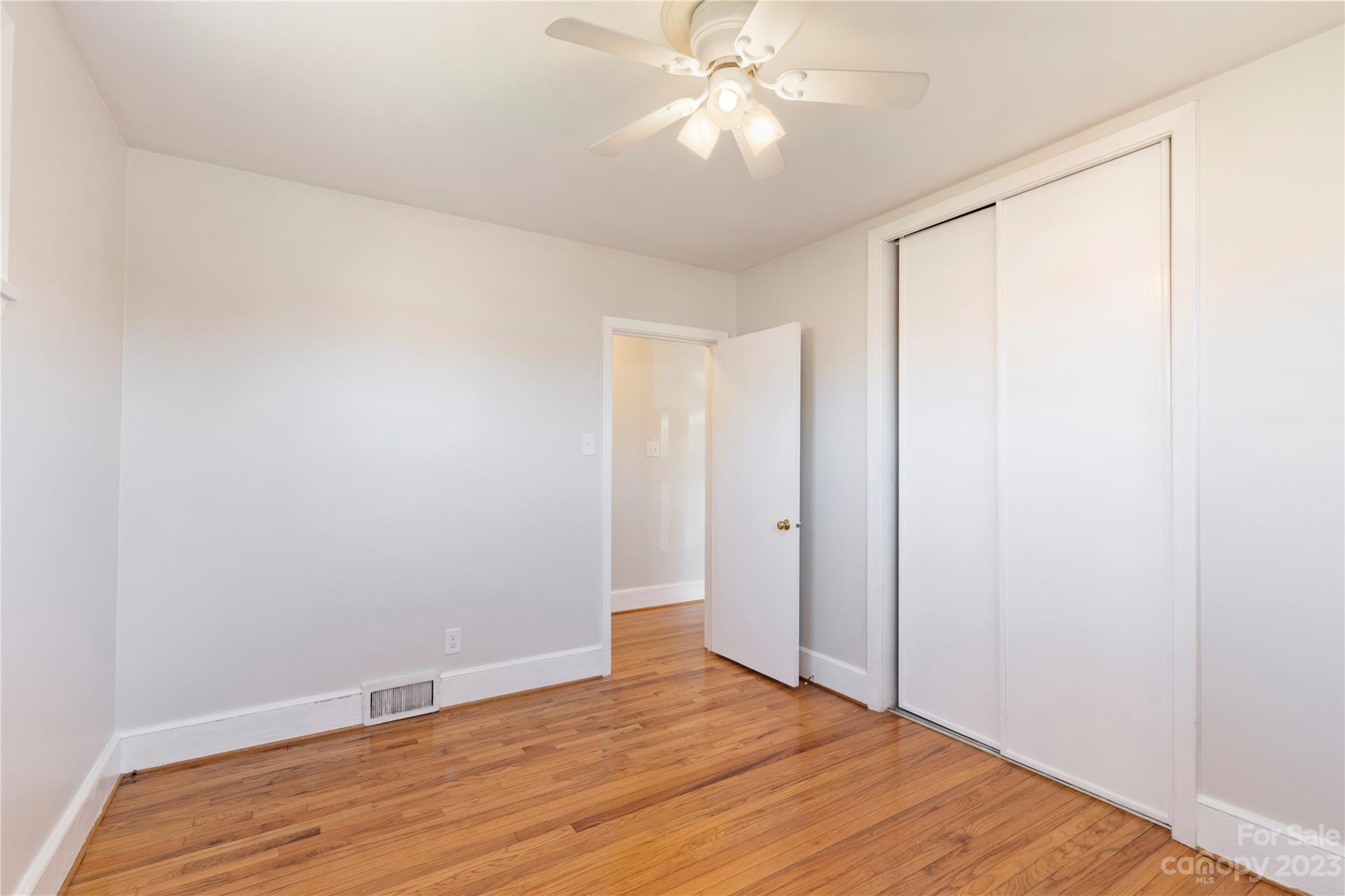 350 South Sharon Amity Road Charlotte, NC 28211 - Photo 18 of 21 a view of empty room with wooden floor