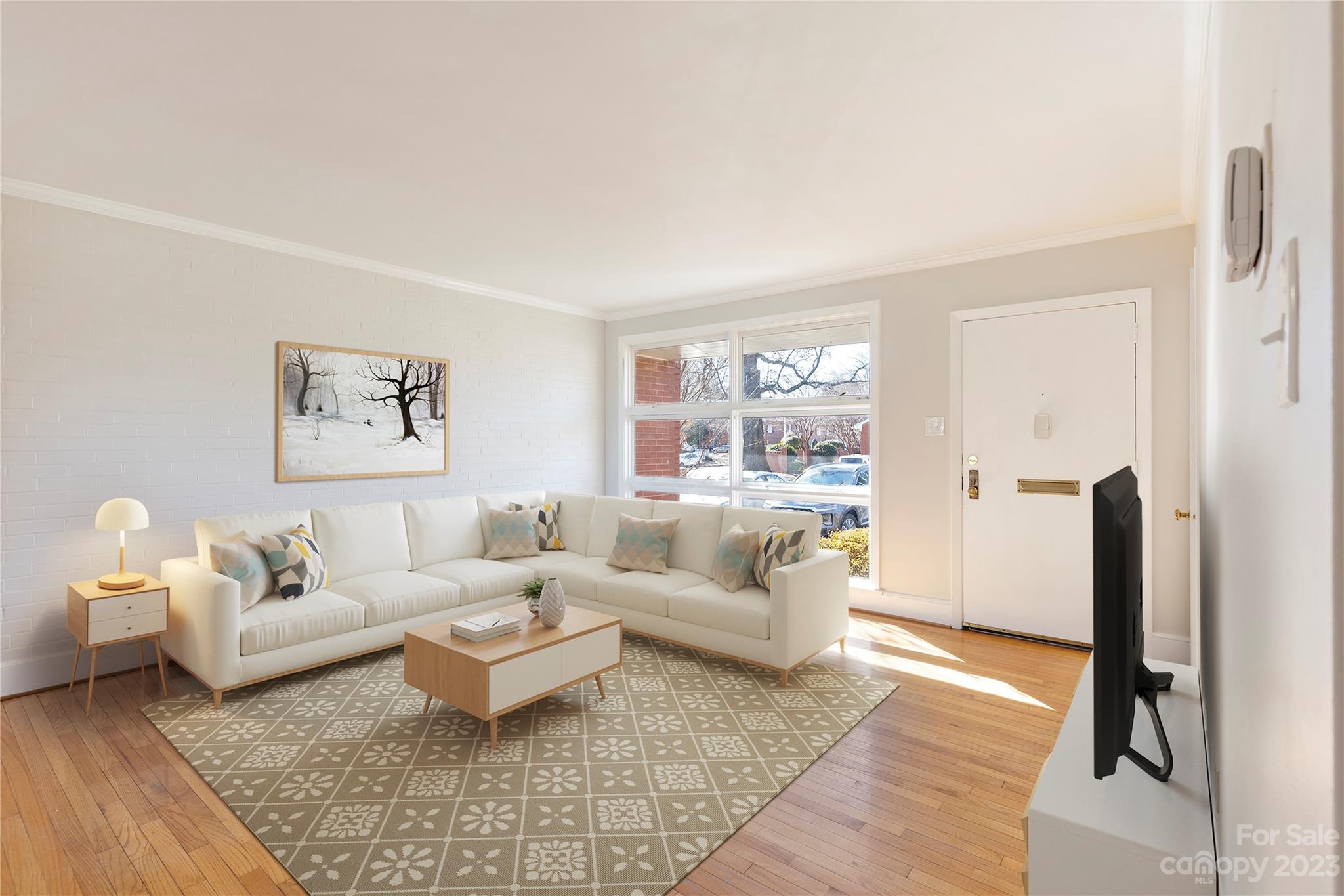 350 South Sharon Amity Road Charlotte, NC 28211 - Photo 4 of 21 a living room with furniture and a rug