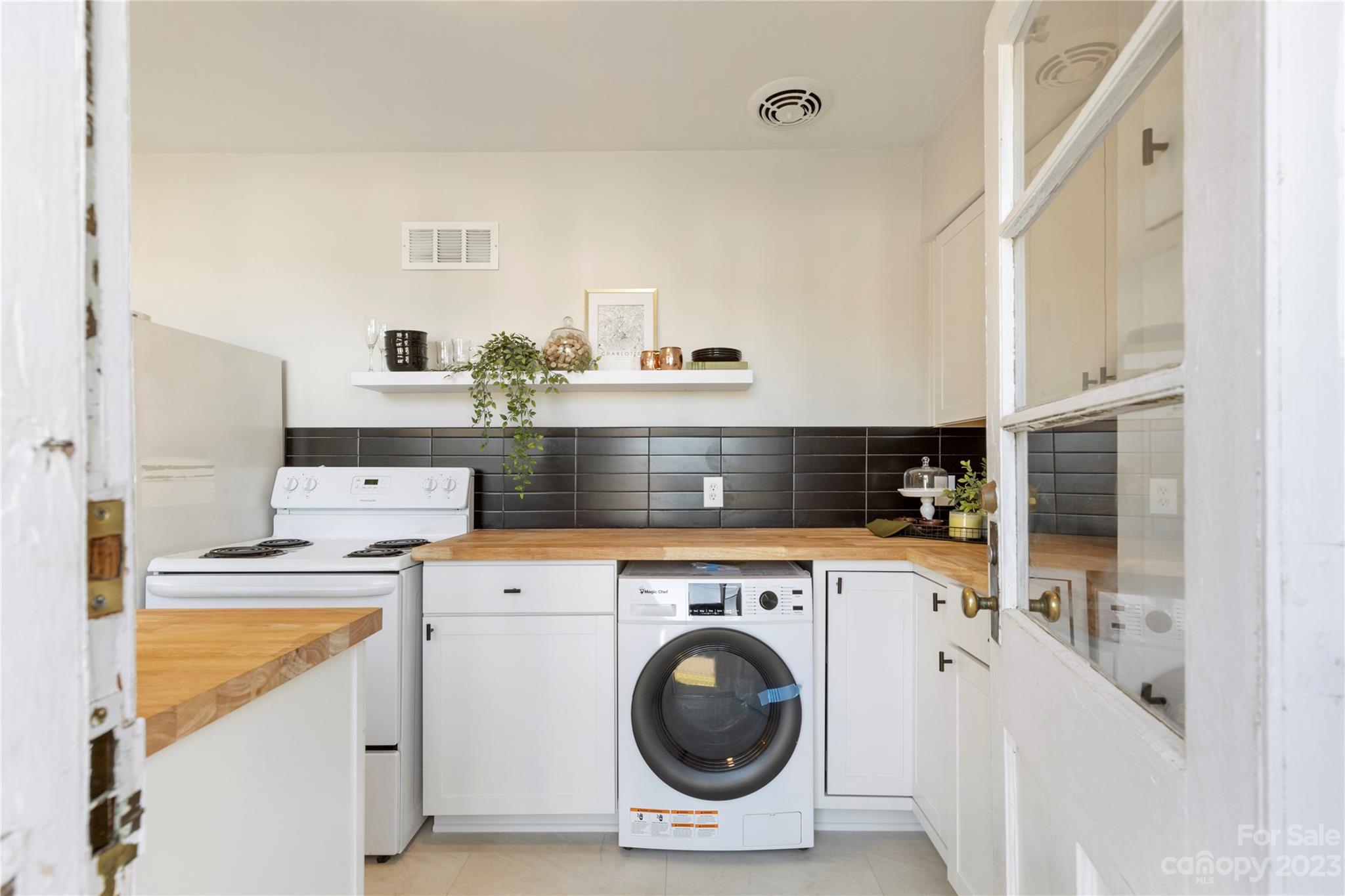 350 South Sharon Amity Road Charlotte, NC 28211 - Photo 9 of 21 a utility room with dryer and washer