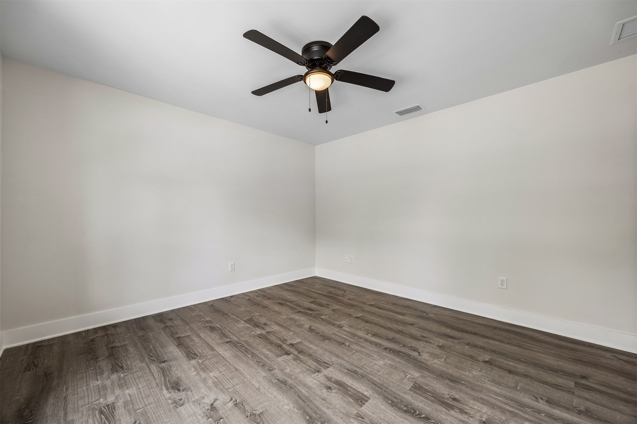 552 Sunset Road Fernandina Beach, FL 32034 - Photo 18 of 23 wooden floor in an empty room