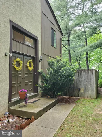 a backyard of a house with seating space