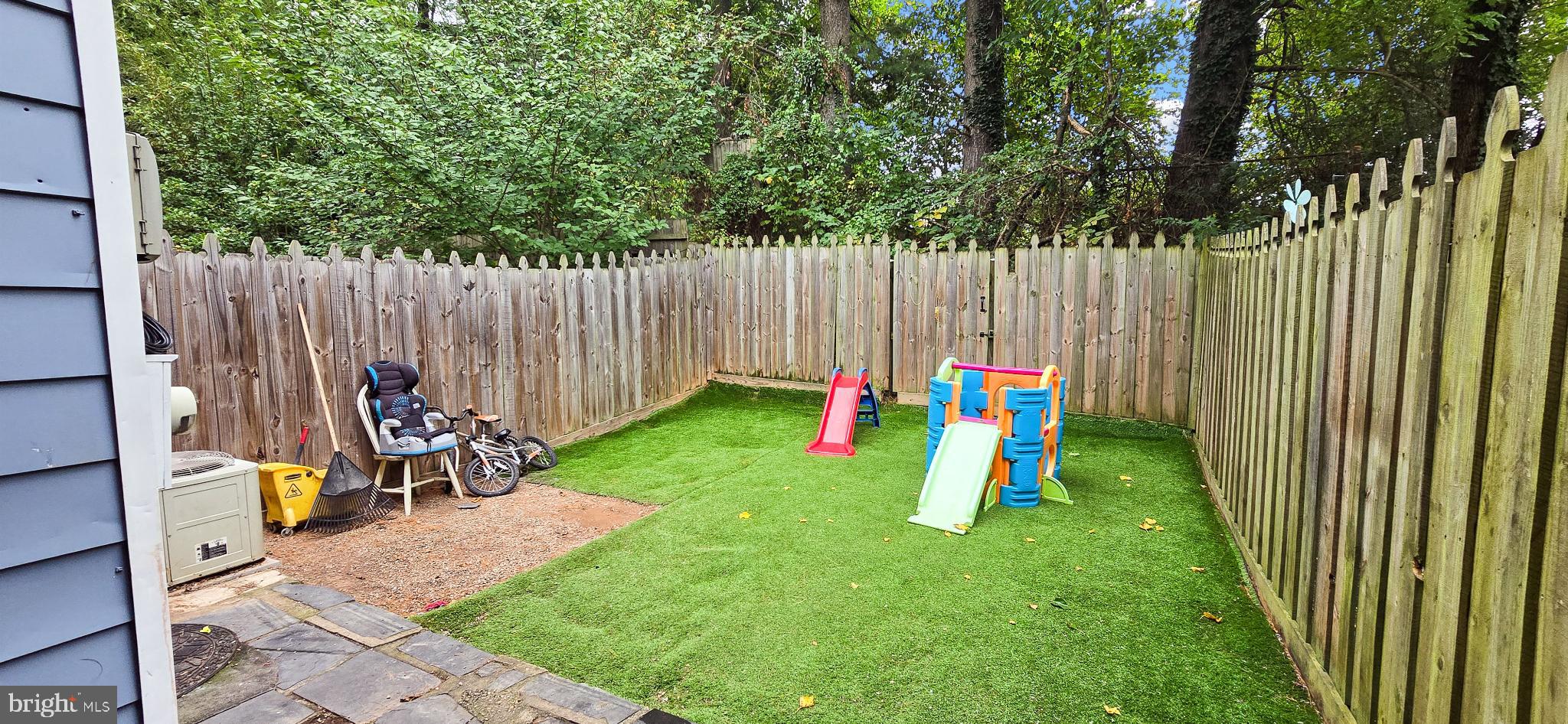 8402 Towne Crest Court Gaithersburg, MD 20877 - Photo 19 of 22 Charming play area with lush green turf.