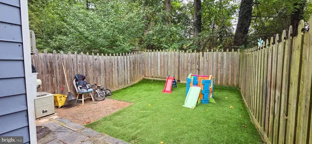 a backyard of a house with seating space