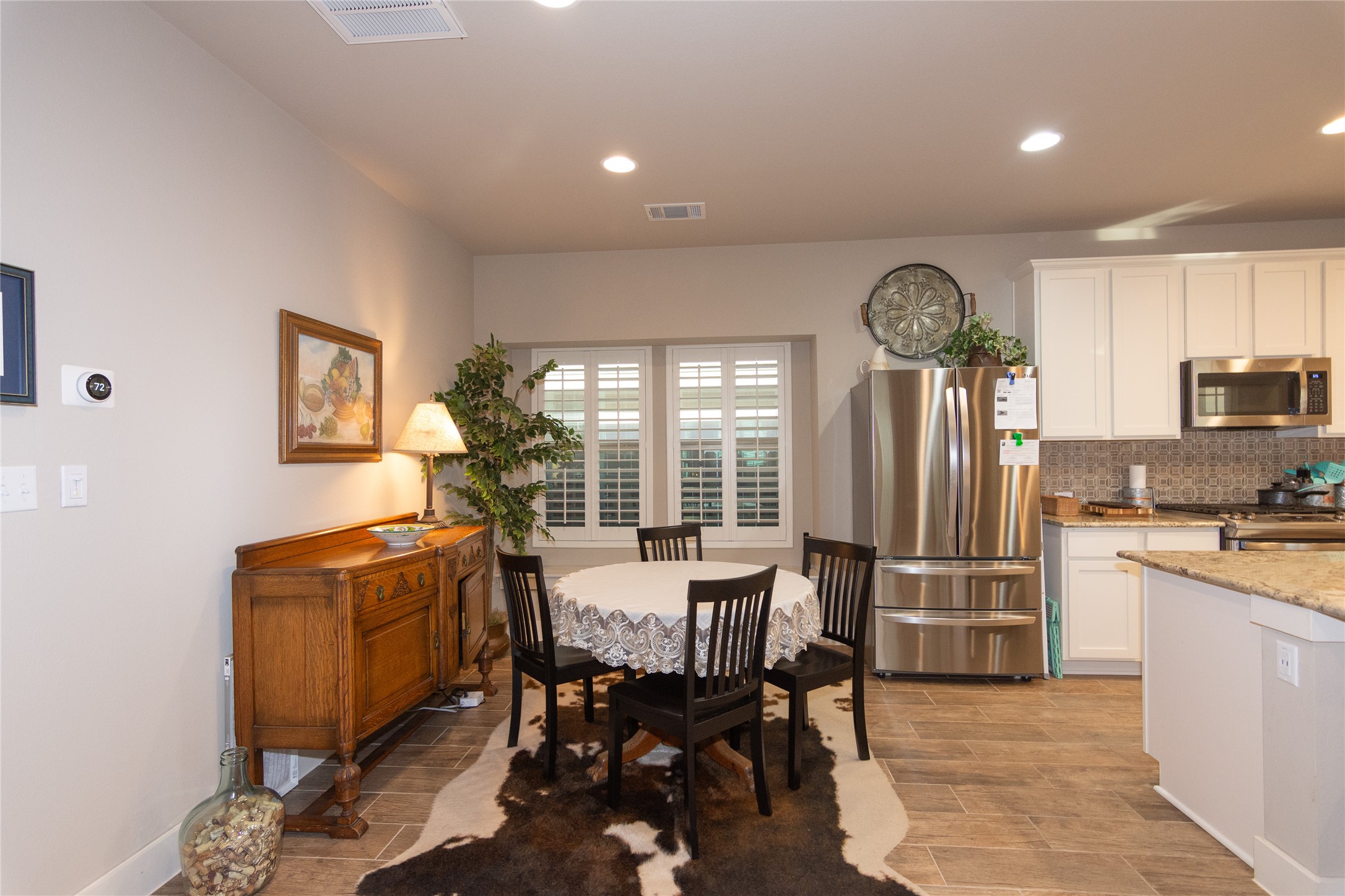 2809 Hopi Path, Unit 12 Leander, TX 78641 - Photo 14 of 34 It will be fun to have friends over after you've slaved in the kitchen all day...just kidding.