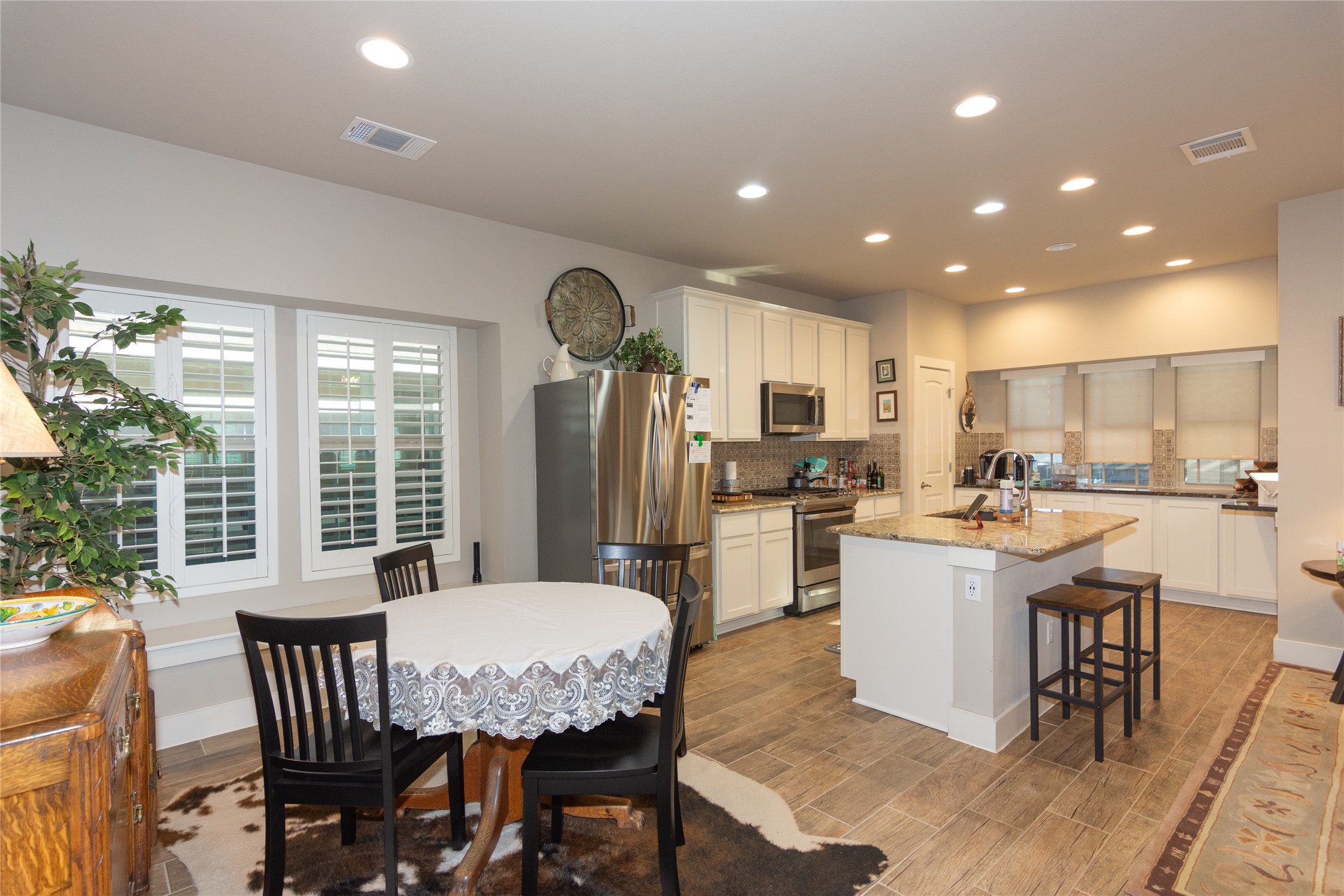 2809 Hopi Path, Unit 12 Leander, TX 78641 - Photo 15 of 34 What a kitchen! Breakfast bar aka center island allows you to throw dinner together and watch your favorite film.