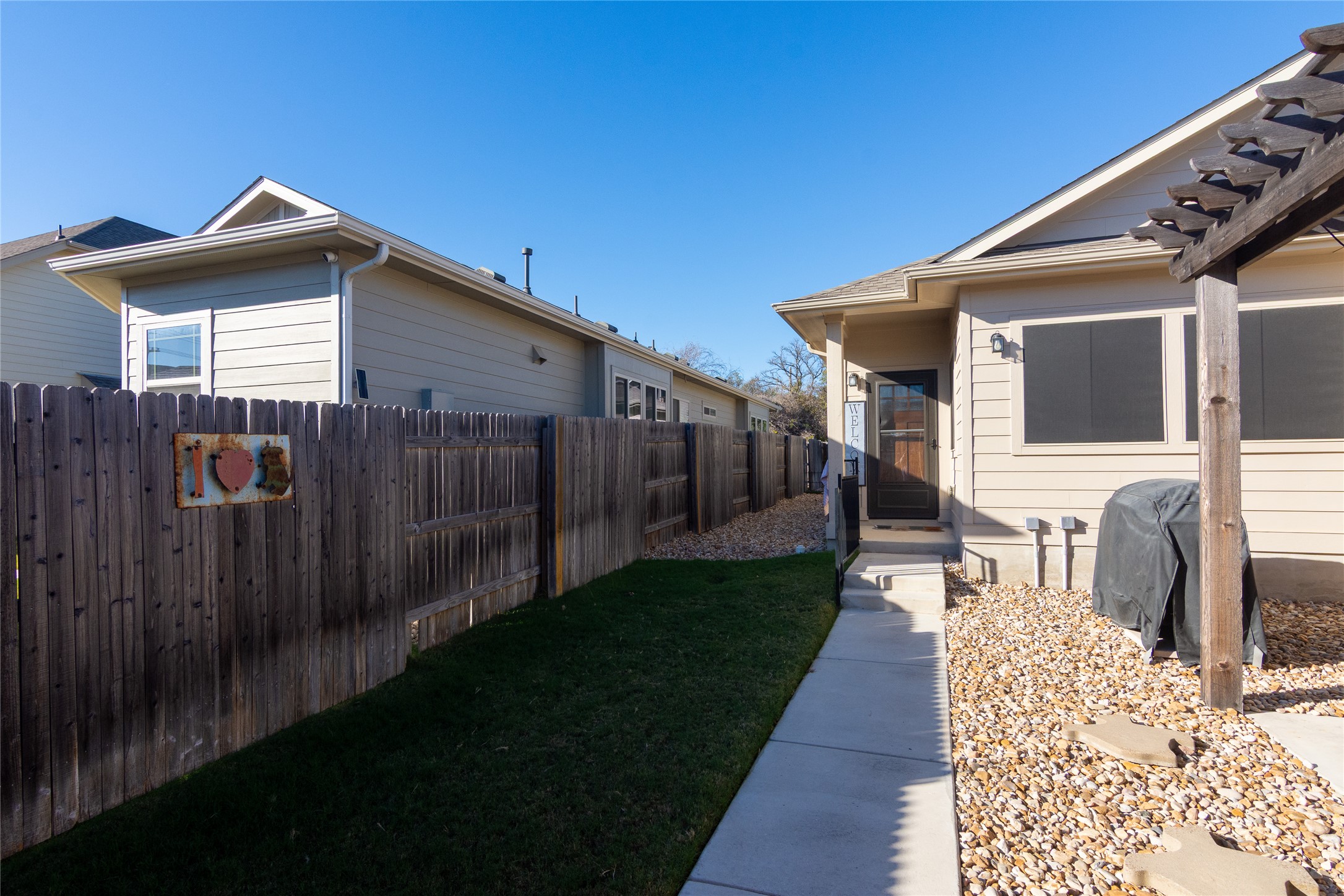 2809 Hopi Path, Unit 12 Leander, TX 78641 - Photo 3 of 34 Enter thru the private gate or your private 2 car garage with a remote.