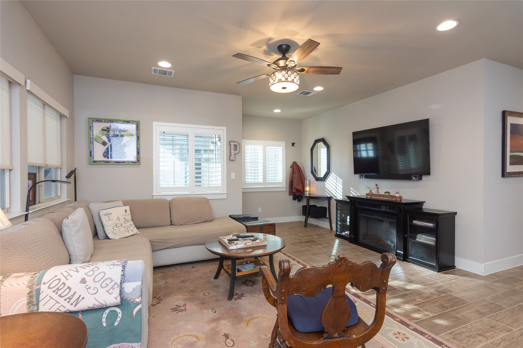 2809 Hopi Path, Unit 12 Leander, TX 78641 - Photo 8 of 34 Big screen is waiting for you along with a woodless fireplace,