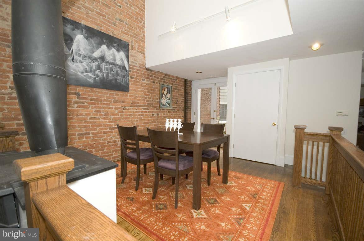 2512 Ontario Road Northwest, Unit 2 Washington, DC 20009 - Photo 3 of 23 Exposed brick, hardwood floors