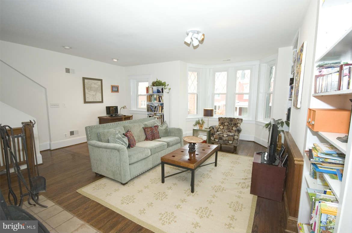 2512 Ontario Road Northwest, Unit 2 Washington, DC 20009 - Photo 6 of 23 Large living with built-in book cases