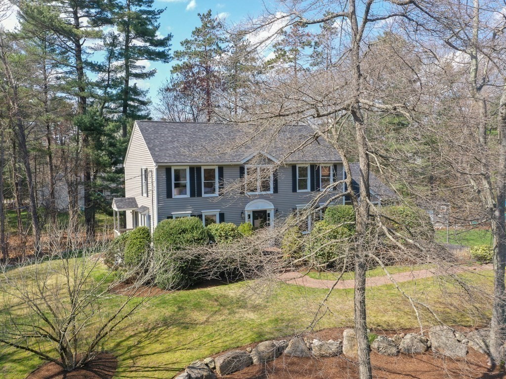 2 Deer Run Road Easton, MA 02356 - Photo 12 of 42 a front view of a house with a yard