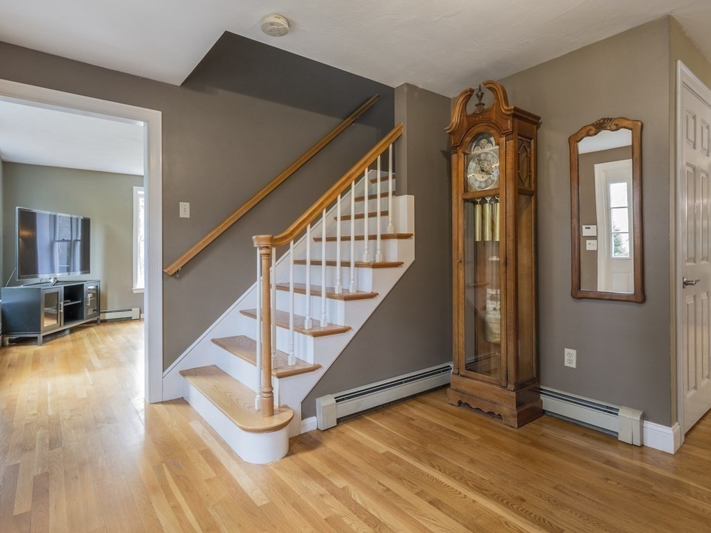 2 Deer Run Road Easton, MA 02356 - Photo 13 of 42 a view of entryway and hall with wooden floor