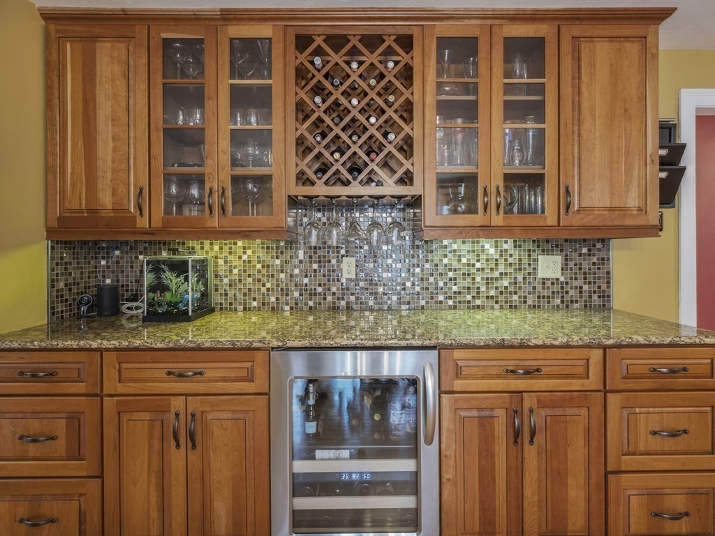 2 Deer Run Road Easton, MA 02356 - Photo 17 of 42 a kitchen with granite countertop a sink and cabinets