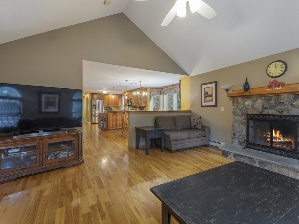 2 Deer Run Road Easton, MA 02356 - Photo 20 of 42 a living room with furniture and a fireplace