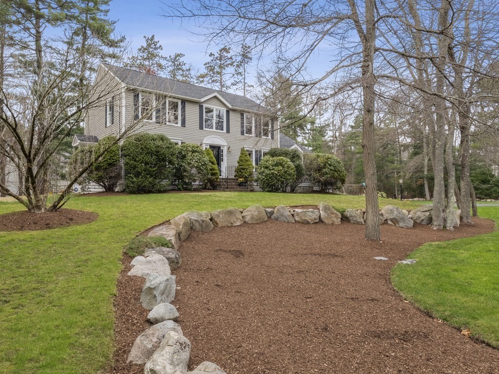 2 Deer Run Road Easton, MA 02356 - Photo 2 of 42 a view of a white house next to a yard with big trees