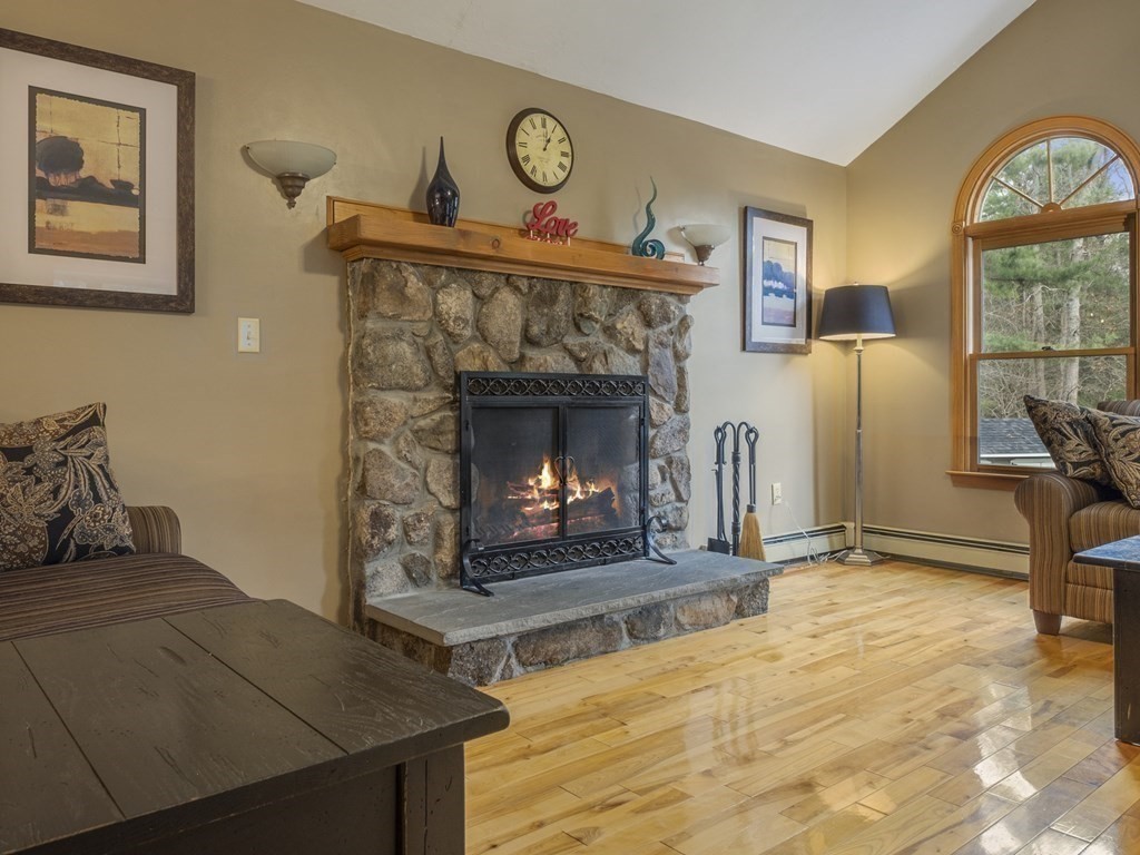 2 Deer Run Road Easton, MA 02356 - Photo 22 of 42 a living room with furniture and a fireplace