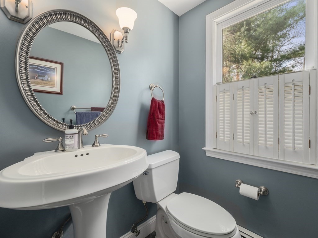 2 Deer Run Road Easton, MA 02356 - Photo 26 of 42 a bathroom with a sink a mirror and a toilet