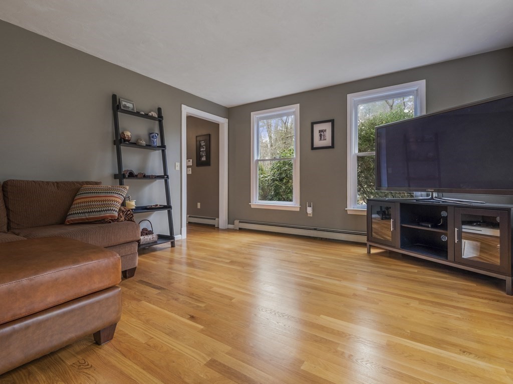 2 Deer Run Road Easton, MA 02356 - Photo 28 of 42 a living room with furniture and a flat screen tv