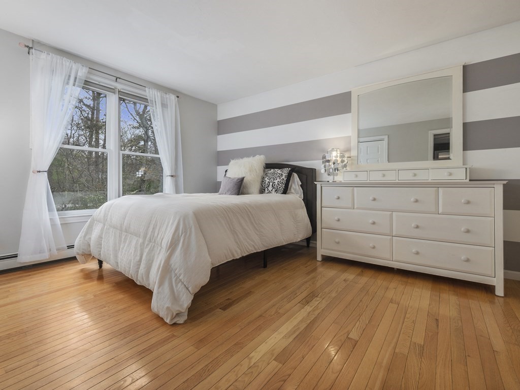 2 Deer Run Road Easton, MA 02356 - Photo 32 of 42 a bedroom with a large bed and a large window