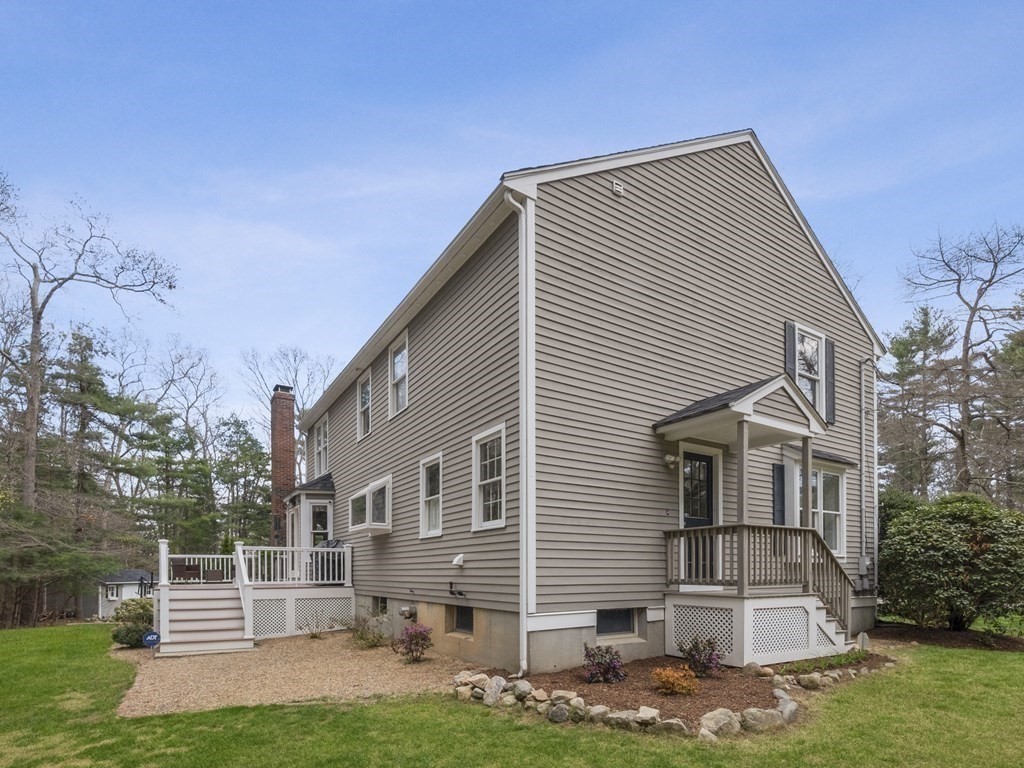 2 Deer Run Road Easton, MA 02356 - Photo 7 of 42 a front view of a house with a yard
