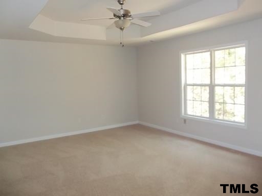 3231 Sunbright Lane Raleigh, NC 27610 - Photo 7 of 15 an empty room with a window