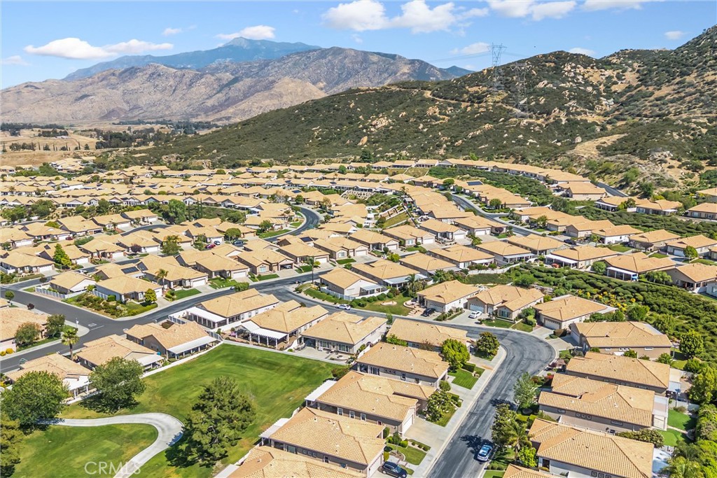 5233 Hampton Road Banning, CA 92220 - Photo 41 of 46 an aerial view of residential houses with outdoor space and trees