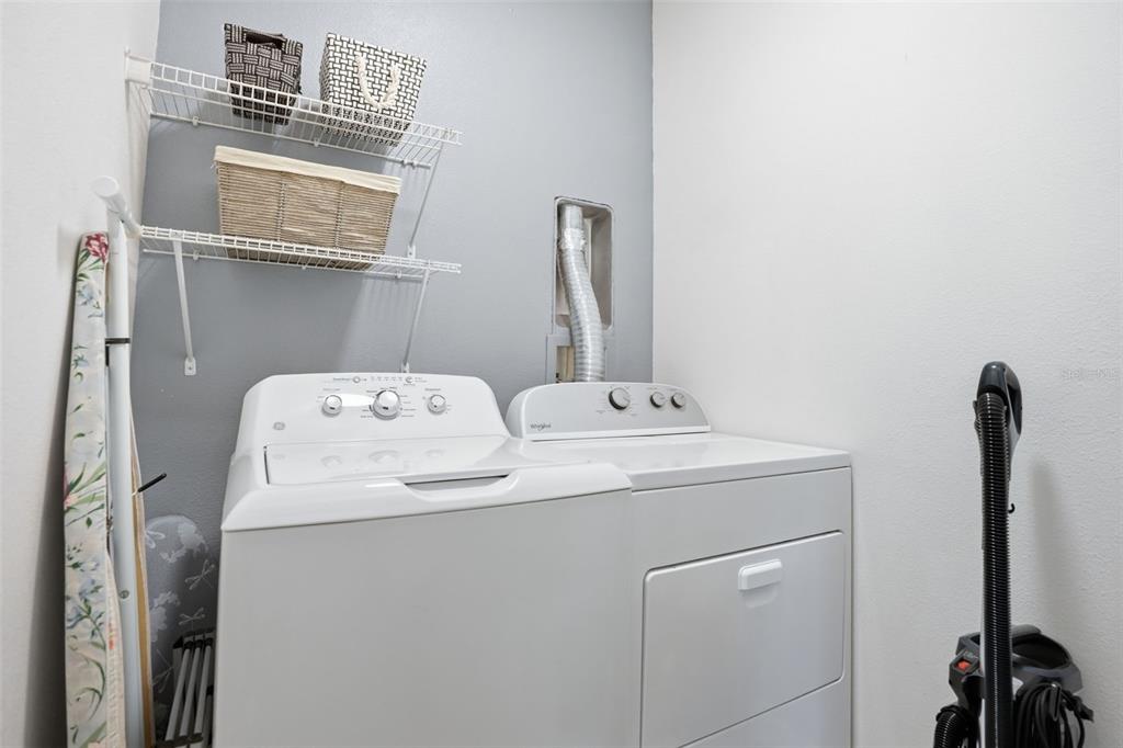 12505 Cavalier Court Hudson, FL 34669 - Photo 31 of 36 a utility room with dryer and washer