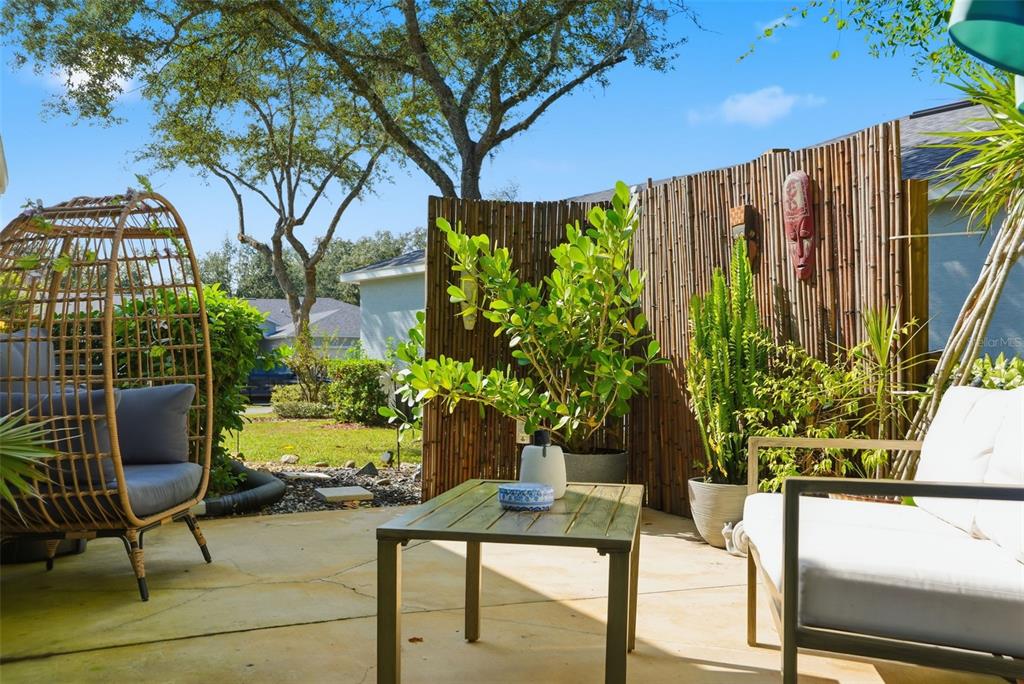 12505 Cavalier Court Hudson, FL 34669 - Photo 34 of 36 a view of two chairs and table in a patio